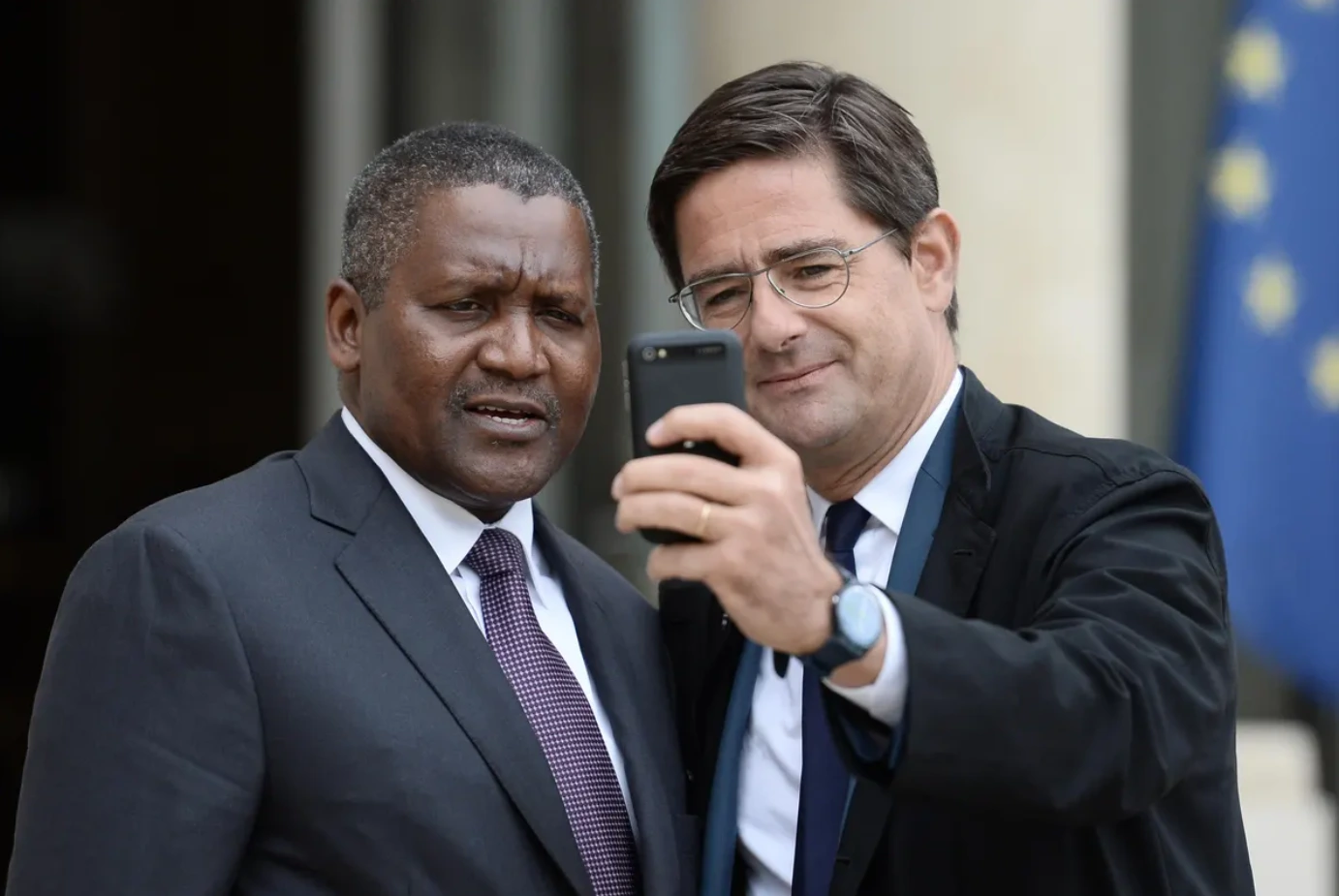 Aliko Dangote and a partner